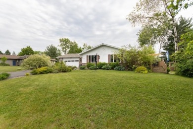 This is a home that checks all the boxes. Inside is a large well on Merrill Golf Club in Wisconsin - for sale on GolfHomes.com, golf home, golf lot
