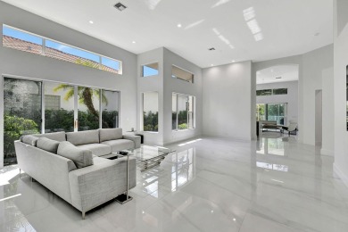 What a spectacular 3 bedroom 4 bath contemporary remodeled home on Broken Sound Golf and Club  in Florida - for sale on GolfHomes.com, golf home, golf lot