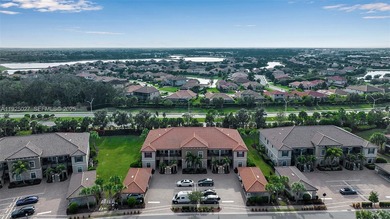 Welcome to this beautifully upgraded non-golf end-unit condo in on Esplanade Golf and Country at Lakewood Ranch in Florida - for sale on GolfHomes.com, golf home, golf lot