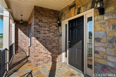 Welcome to 1116 Barberry Ct, nestled in the sought-after on Traditions of Braselton Golf Club in Georgia - for sale on GolfHomes.com, golf home, golf lot