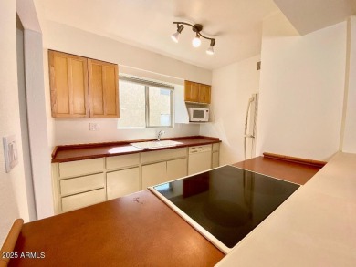 Charming and convenient single level Condo at Camelback House on The Phoenician  in Arizona - for sale on GolfHomes.com, golf home, golf lot