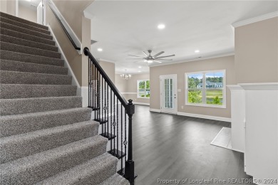 The epitome of serenity, with an open layout, modern finishes on Kings Grant Golf and Country Club in North Carolina - for sale on GolfHomes.com, golf home, golf lot