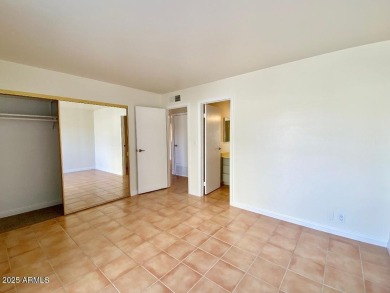 Charming and convenient single level Condo at Camelback House on The Phoenician  in Arizona - for sale on GolfHomes.com, golf home, golf lot