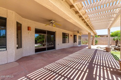 Just steps from the clubhouse, this expanded Palmera Model in on Oakwood Golf Club  in Arizona - for sale on GolfHomes.com, golf home, golf lot