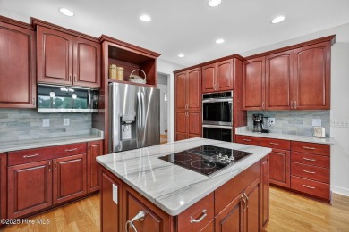 Step into this stunning upgraded and completely remodeled home on Brunswick Plantation and Golf Resorts in North Carolina - for sale on GolfHomes.com, golf home, golf lot
