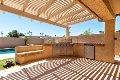 Just steps from the clubhouse, this expanded Palmera Model in on Oakwood Golf Club  in Arizona - for sale on GolfHomes.com, golf home, golf lot