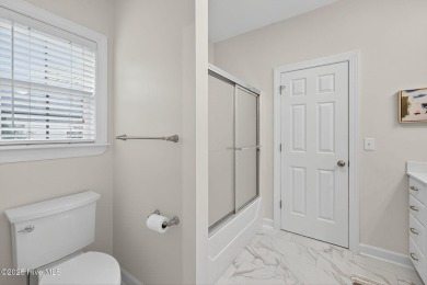 Step into this stunning upgraded and completely remodeled home on Brunswick Plantation and Golf Resorts in North Carolina - for sale on GolfHomes.com, golf home, golf lot