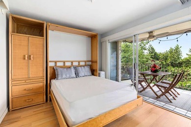 This Keauhou Akahi 2nd floor upgraded unit has beautiful views on Kona Country Club Golf Course in Hawaii - for sale on GolfHomes.com, golf home, golf lot