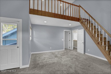 Custom built home with water access at the Olde Point Marina on on Olde Point Golf and Country Club in North Carolina - for sale on GolfHomes.com, golf home, golf lot