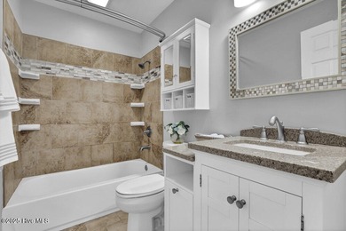 Custom built home with water access at the Olde Point Marina on on Olde Point Golf and Country Club in North Carolina - for sale on GolfHomes.com, golf home, golf lot