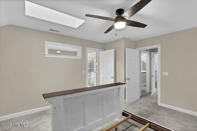 Custom built home with water access at the Olde Point Marina on on Olde Point Golf and Country Club in North Carolina - for sale on GolfHomes.com, golf home, golf lot