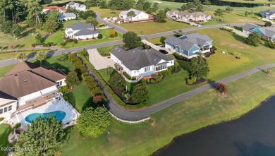 Step into this stunning upgraded and completely remodeled home on Brunswick Plantation and Golf Resorts in North Carolina - for sale on GolfHomes.com, golf home, golf lot