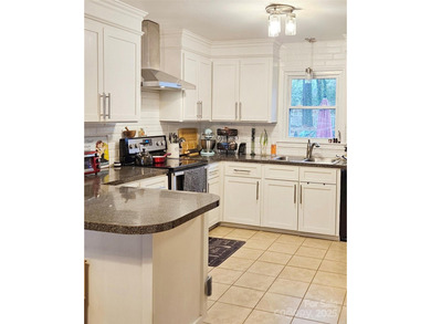 This charming 3-bed, 2-bath home is located in the highly on Westport Golf Club in North Carolina - for sale on GolfHomes.com, golf home, golf lot