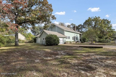 Custom built home with water access at the Olde Point Marina on on Olde Point Golf and Country Club in North Carolina - for sale on GolfHomes.com, golf home, golf lot