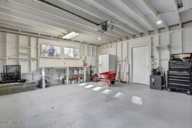 Custom built home with water access at the Olde Point Marina on on Olde Point Golf and Country Club in North Carolina - for sale on GolfHomes.com, golf home, golf lot