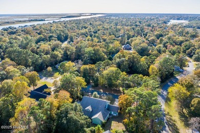 Custom built home with water access at the Olde Point Marina on on Olde Point Golf and Country Club in North Carolina - for sale on GolfHomes.com, golf home, golf lot