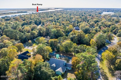 Custom built home with water access at the Olde Point Marina on on Olde Point Golf and Country Club in North Carolina - for sale on GolfHomes.com, golf home, golf lot