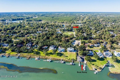 Custom built home with water access at the Olde Point Marina on on Olde Point Golf and Country Club in North Carolina - for sale on GolfHomes.com, golf home, golf lot