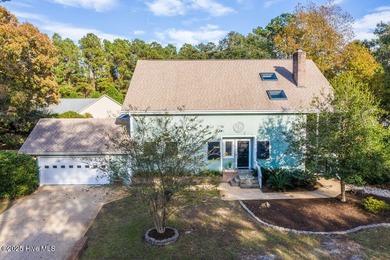 Custom built home with water access at the Olde Point Marina on on Olde Point Golf and Country Club in North Carolina - for sale on GolfHomes.com, golf home, golf lot