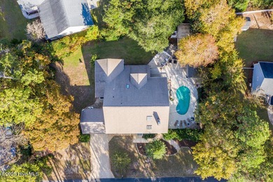 Custom built home with water access at the Olde Point Marina on on Olde Point Golf and Country Club in North Carolina - for sale on GolfHomes.com, golf home, golf lot