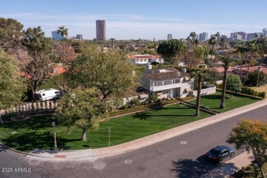 Welcome to a quiet slice of California in the iconic on Encanto 18 Golf Course in Arizona - for sale on GolfHomes.com, golf home, golf lot