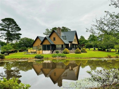 This exquisite 3-bedroom custom home by Hornaday Homes is on Cypress Lakes Golf Course in North Carolina - for sale on GolfHomes.com, golf home, golf lot