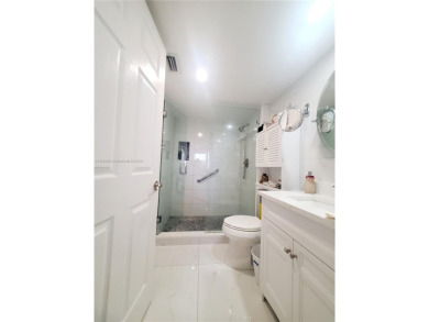 MUST SEE! Beautifully remodeled 2nd floor 2/2 condo in an active on Sunrise Lakes Phase IV Golf Course in Florida - for sale on GolfHomes.com, golf home, golf lot