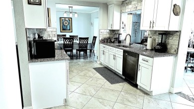This spotless like new home can be yours! Mainlands of Tamarac on Mainlands Golf Club in Florida - for sale on GolfHomes.com, golf home, golf lot