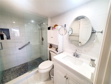 MUST SEE! Beautifully remodeled 2nd floor 2/2 condo in an active on Sunrise Lakes Phase IV Golf Course in Florida - for sale on GolfHomes.com, golf home, golf lot