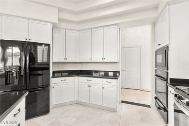 This stunning semi-custom two-story home offers luxury living in on WildHorse Golf Club in Nevada - for sale on GolfHomes.com, golf home, golf lot