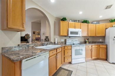 Under contract-accepting backup offers. Furnished / on Ridgewood Lakes Golf and Country Club in Florida - for sale on GolfHomes.com, golf home, golf lot