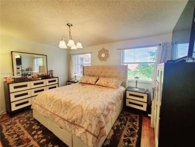 MUST SEE! Beautifully remodeled 2nd floor 2/2 condo in an active on Sunrise Lakes Phase IV Golf Course in Florida - for sale on GolfHomes.com, golf home, golf lot