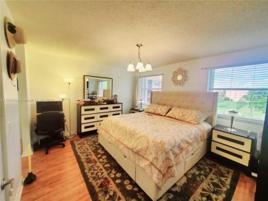 MUST SEE! Beautifully remodeled 2nd floor 2/2 condo in an active on Sunrise Lakes Phase IV Golf Course in Florida - for sale on GolfHomes.com, golf home, golf lot