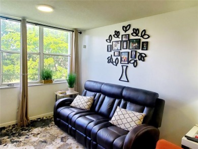 MUST SEE! Beautifully remodeled 2nd floor 2/2 condo in an active on Sunrise Lakes Phase IV Golf Course in Florida - for sale on GolfHomes.com, golf home, golf lot