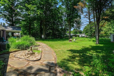 Introducing an exceptional Westwood home, perfectly poised on on Grand Prairie Golf Course in Michigan - for sale on GolfHomes.com, golf home, golf lot