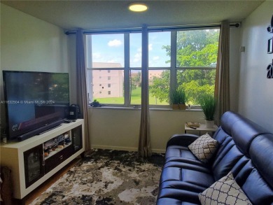 MUST SEE! Beautifully remodeled 2nd floor 2/2 condo in an active on Sunrise Lakes Phase IV Golf Course in Florida - for sale on GolfHomes.com, golf home, golf lot