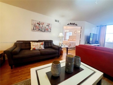 MUST SEE! Beautifully remodeled 2nd floor 2/2 condo in an active on Sunrise Lakes Phase IV Golf Course in Florida - for sale on GolfHomes.com, golf home, golf lot