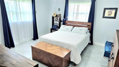 Welcome to this spotless, like new home that can be yours! on Mainlands Golf Club in Florida - for sale on GolfHomes.com, golf home, golf lot