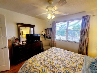 MUST SEE! Beautifully remodeled 2nd floor 2/2 condo in an active on Sunrise Lakes Phase IV Golf Course in Florida - for sale on GolfHomes.com, golf home, golf lot