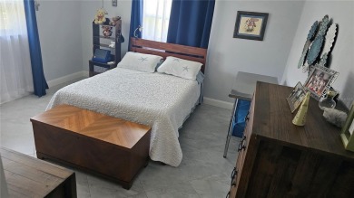 Welcome to this spotless, like new home that can be yours! on Mainlands Golf Club in Florida - for sale on GolfHomes.com, golf home, golf lot