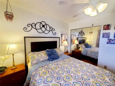 MUST SEE! Beautifully remodeled 2nd floor 2/2 condo in an active on Sunrise Lakes Phase IV Golf Course in Florida - for sale on GolfHomes.com, golf home, golf lot