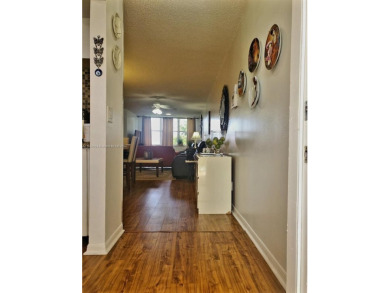 MUST SEE! Beautifully remodeled 2nd floor 2/2 condo in an active on Sunrise Lakes Phase IV Golf Course in Florida - for sale on GolfHomes.com, golf home, golf lot