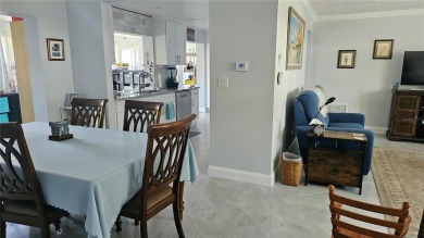 Welcome to this spotless, like new home that can be yours! on Mainlands Golf Club in Florida - for sale on GolfHomes.com, golf home, golf lot