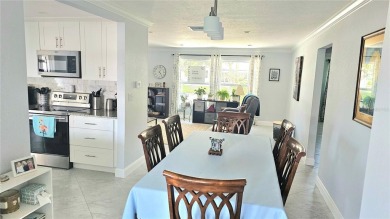 Welcome to this spotless, like new home that can be yours! on Mainlands Golf Club in Florida - for sale on GolfHomes.com, golf home, golf lot