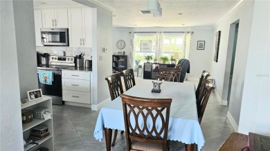 Welcome to this spotless, like new home that can be yours! on Mainlands Golf Club in Florida - for sale on GolfHomes.com, golf home, golf lot
