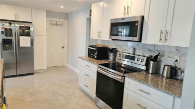 Welcome to this spotless, like new home that can be yours! on Mainlands Golf Club in Florida - for sale on GolfHomes.com, golf home, golf lot