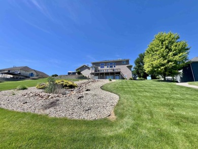 Luxury living meets breathtaking views at this stunning property on Deer Run Golf Course in Iowa - for sale on GolfHomes.com, golf home, golf lot