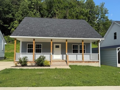 LOCATED WITHIN STEPS to PAINTSVILLE GOLF COURSE, you will find on Paintsville Country Club in Kentucky - for sale on GolfHomes.com, golf home, golf lot