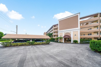 Experience serene living in this inviting 3-bedroom end-unit on  in Florida - for sale on GolfHomes.com, golf home, golf lot
