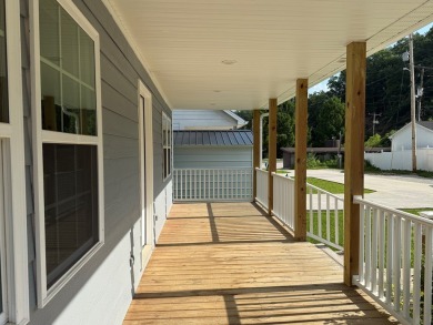 LOCATED WITHIN STEPS to PAINTSVILLE GOLF COURSE, you will find on Paintsville Country Club in Kentucky - for sale on GolfHomes.com, golf home, golf lot